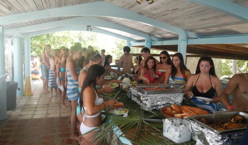 high school students on spring break waiting in a buffet line