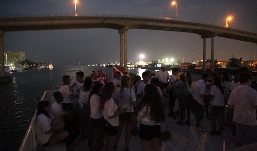 A group of students enjoying an evening in Nassau, on their graduation trip.