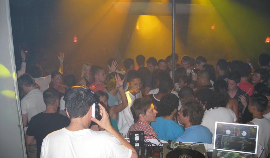 high school students on Spring break watching a DJ perform