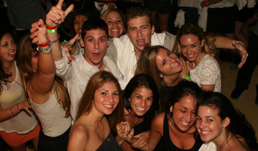 group of high school students posing for a photo during their Spring break trip to Nassau