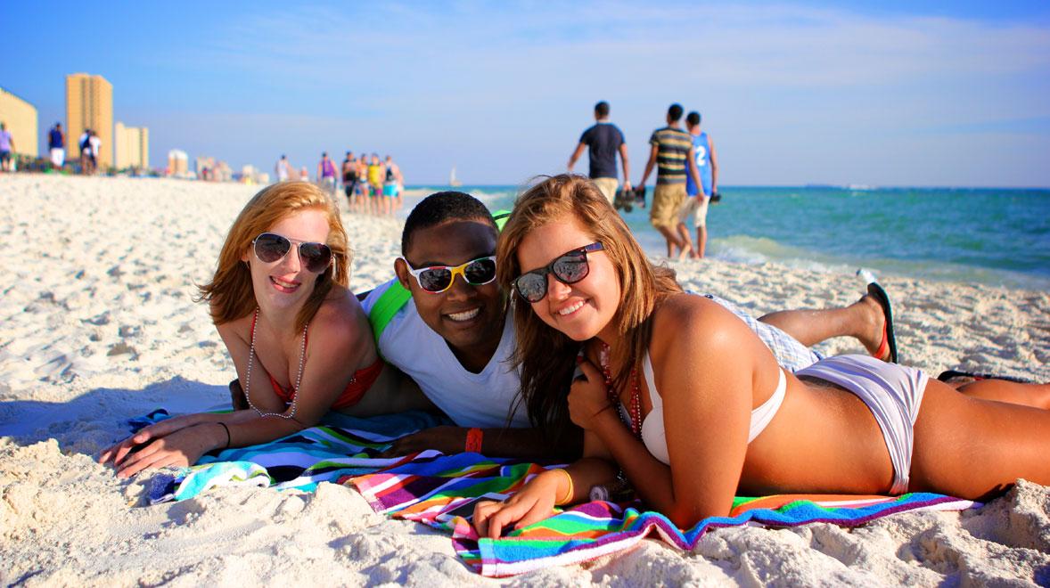 3 friends on the beach in Panama City Beach during spring break