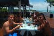 high school students eating at a picnic table in Nassau