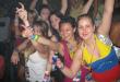 a group of girls posing on the dance floor