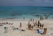 Students on the beach on a graduation trip to Cancun, Mexico
